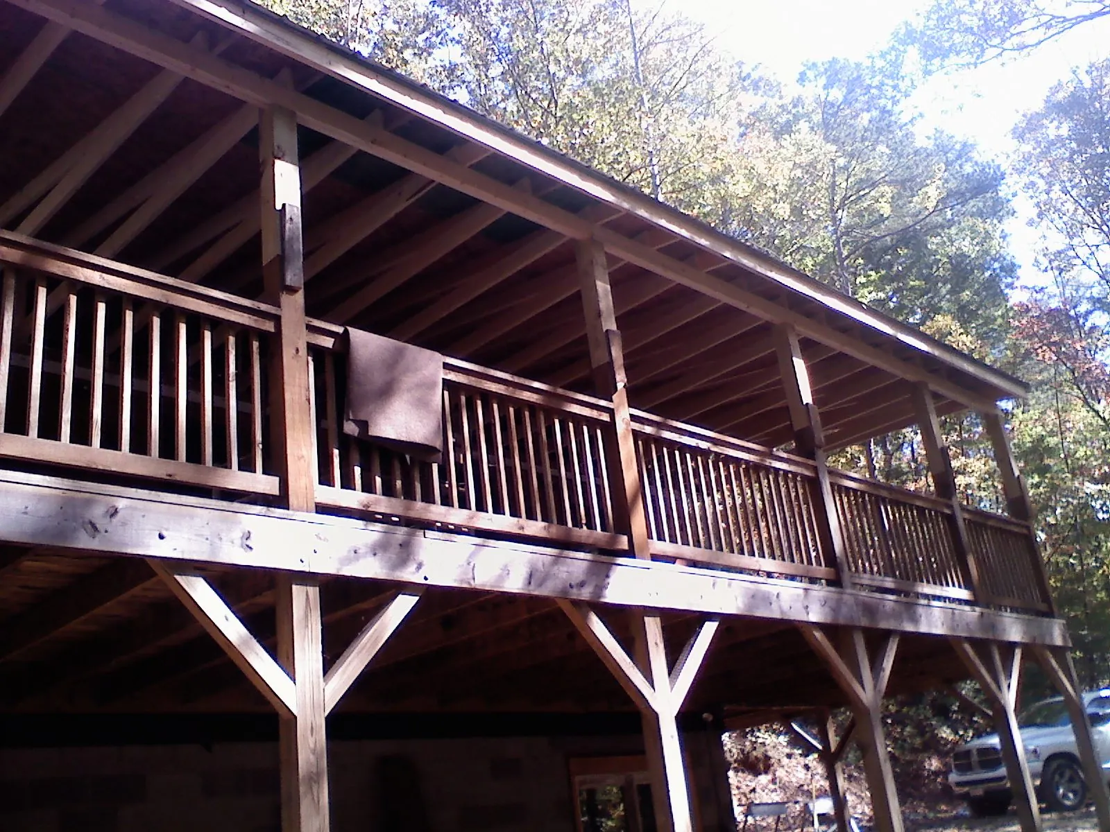 Timber framing under a new elevated porch and deck — Roof Leak Repair in Blossvale by Roofing Brothers